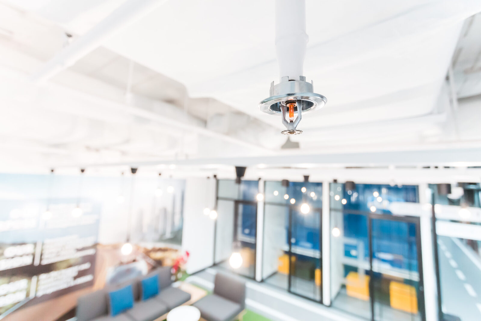 Fire sprinkler and life-safety system in a commercial building ceiling