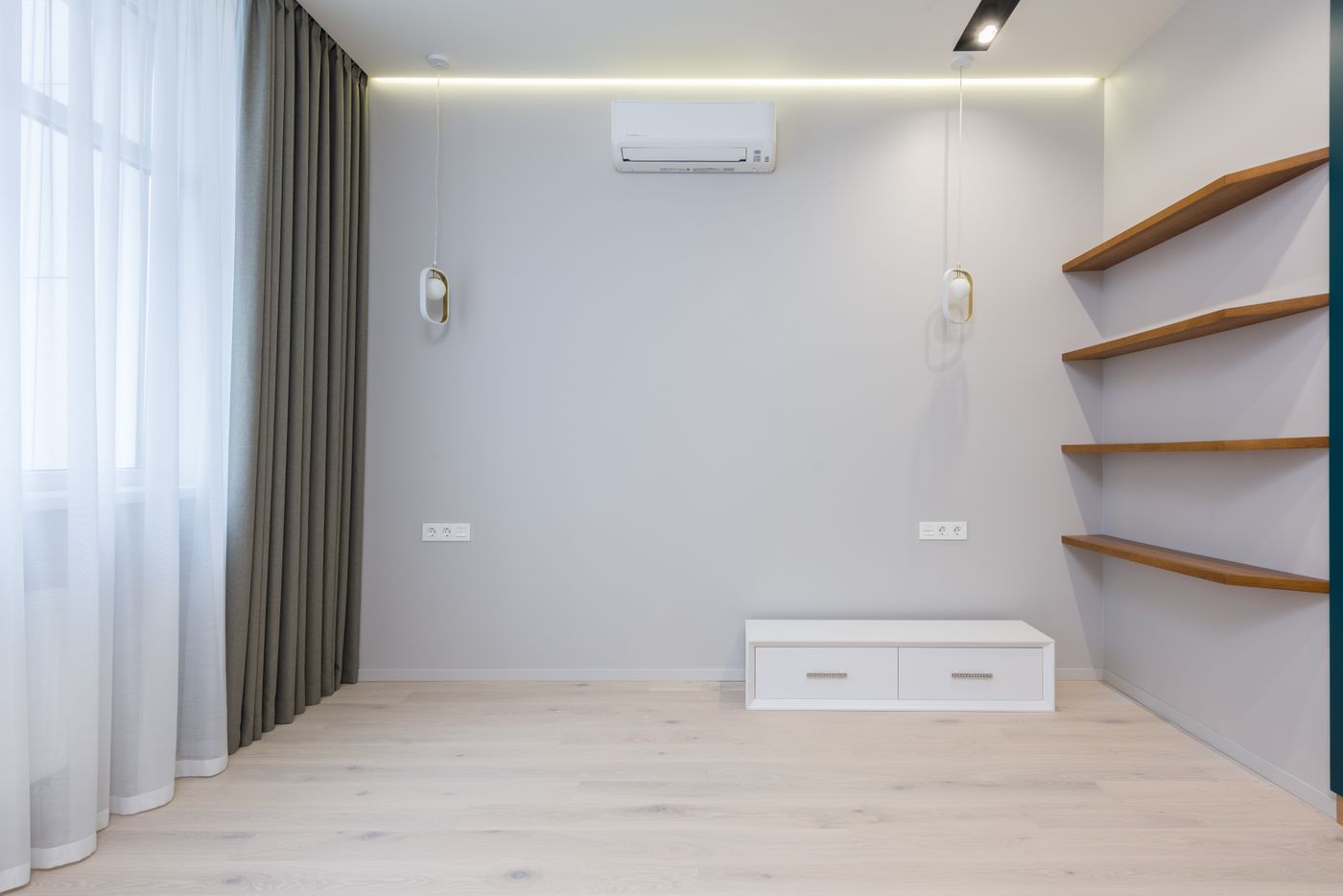 Ductless mini-split unit mounted on a wall